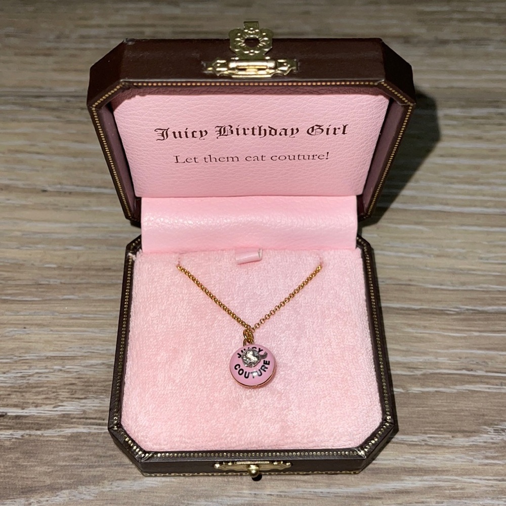 Never worn Juicy Couture cupcake locket necklace.